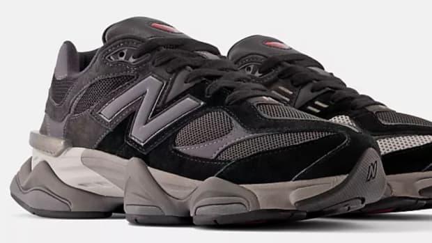 View of black and grey New Balance shoes.